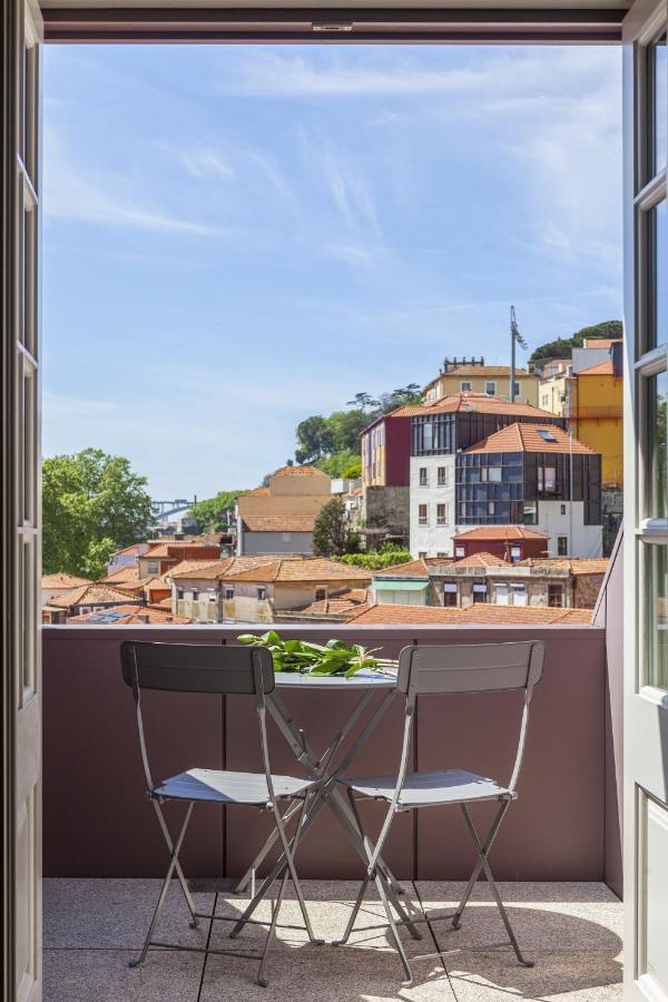 Timbre Virtudes Hotel Porto Exterior photo View from the balcony of a typical apartment